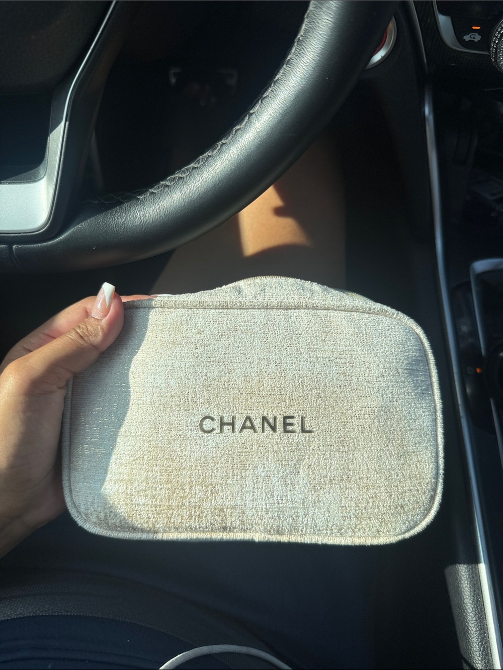 CHANEL Cream Textured Cosmetic Pouch